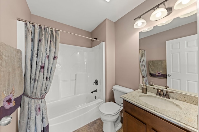 bathroom featuring toilet, shower / bath combo, and vanity