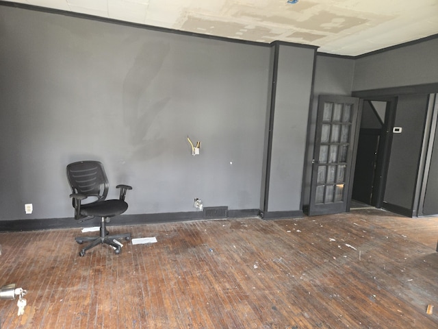 708 W Jefferson St W, Bloomington, IL 61701 - spare room with wood-type flooring and baseboards