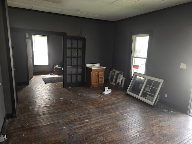 708 W Jefferson St W, Bloomington, IL 61701 - empty room with dark wood-style flooring