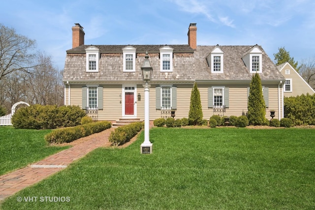 1930 Camphill Cir, Inverness, IL 60067 - cape cod house featuring a front yard and a chimney