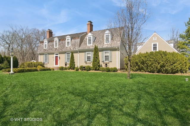 1930 Camphill Cir, Inverness, IL 60067 - new england style home with a front lawn and a chimney