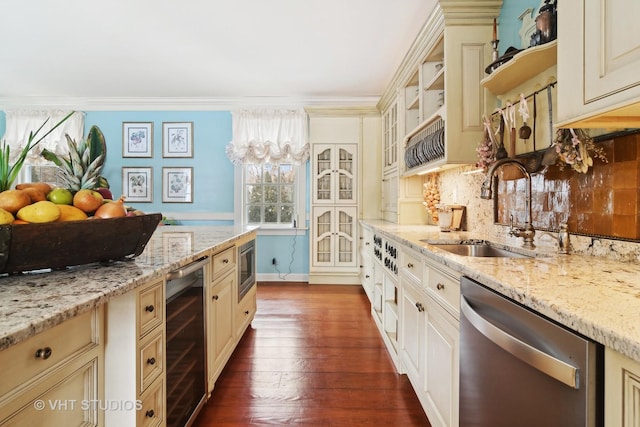 1930 Camphill Cir, Inverness, IL 60067 - kitchen featuring beverage cooler, cream cabinetry, a sink, a wealth of natural light, and appliances with stainless steel finishes