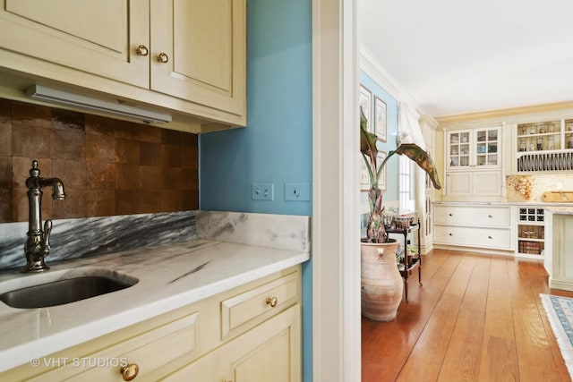 1930 Camphill Cir, Inverness, IL 60067 - bar with hardwood / wood-style floors, a sink, and backsplash