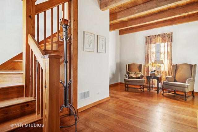 1930 Camphill Cir, Inverness, IL 60067 - living area featuring wood finished floors, wood ceiling, beamed ceiling, baseboards, and visible vents