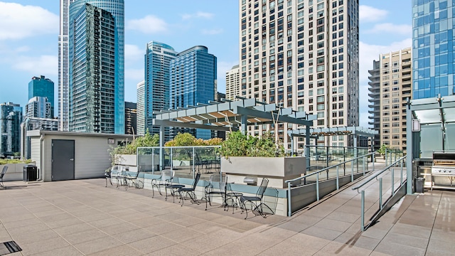 474 N Lake Shore Dr Unit 4105, Chicago, IL 60611 - view of patio / terrace with a skyline view and central AC unit