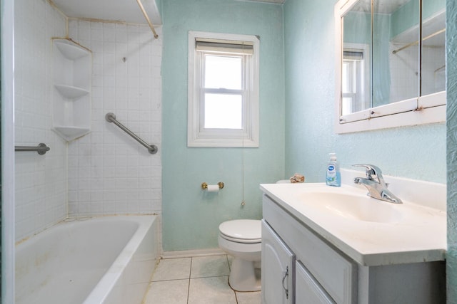 bathroom with toilet, tile patterned flooring, vanity, and shower / washtub combination