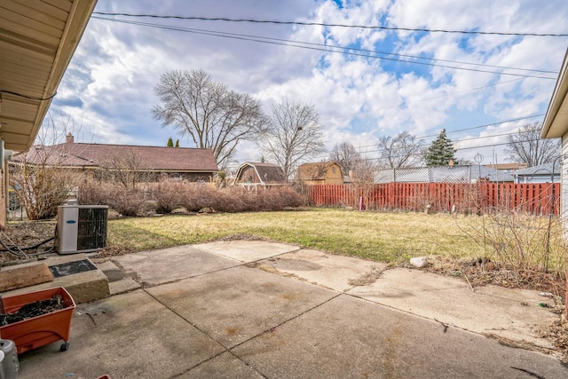 view of patio featuring central AC and fence