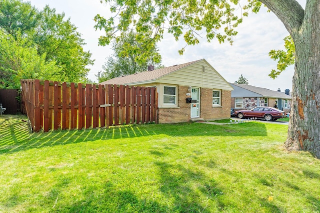 view of yard featuring entry steps and fence