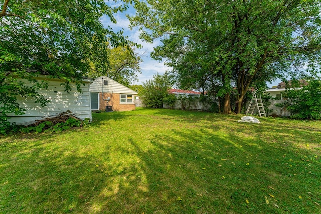 view of yard featuring fence