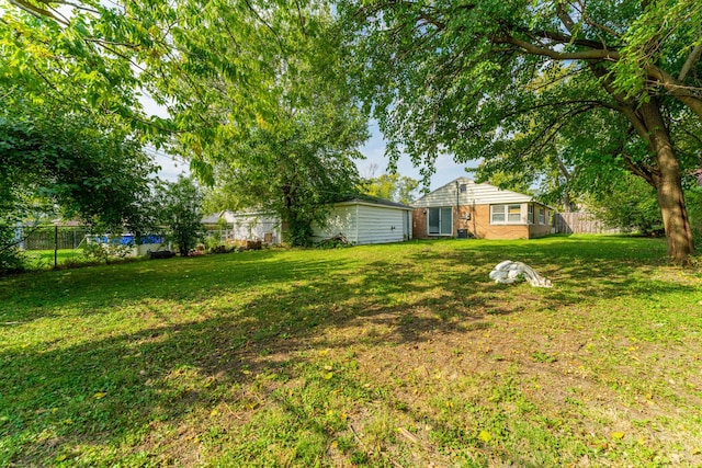 view of yard featuring fence