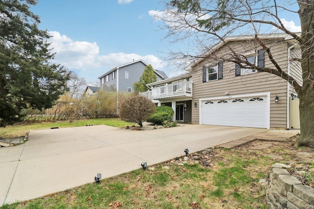 traditional home featuring driveway and a garage