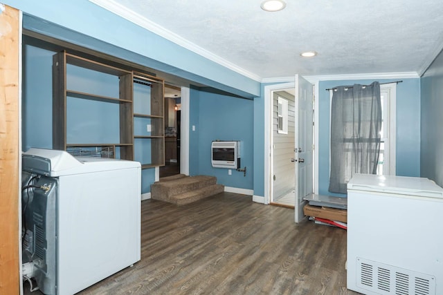 114 W Columbia St, Danvers, IL 61732 - washroom featuring crown molding, heating unit, dark wood-style flooring, and baseboards