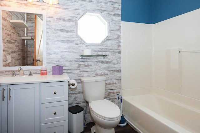 114 W Columbia St, Danvers, IL 61732 - bathroom featuring shower / bathtub combination, toilet, and vanity