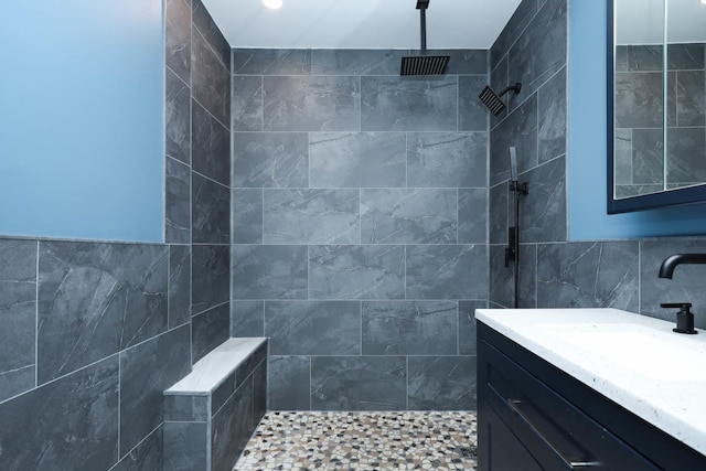 114 W Columbia St, Danvers, IL 61732 - full bathroom featuring tile walls, vanity, and tiled shower