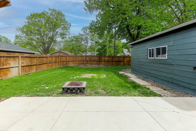 114 W Columbia St, Danvers, IL 61732 - view of yard featuring a fenced backyard, an outdoor fire pit, and a patio area