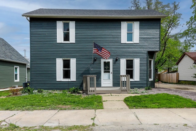 114 W Columbia St, Danvers, IL 61732 - colonial home with fence and a front lawn