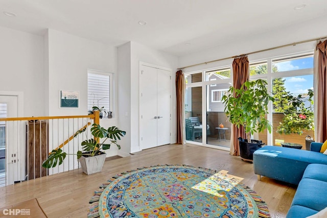interior space featuring wood finished floors and baseboards