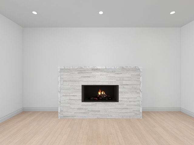 3031 Indianwood Rd, Wilmette, IL 60091 - detailed view of wood finished floors, recessed lighting, a stone fireplace, and baseboards