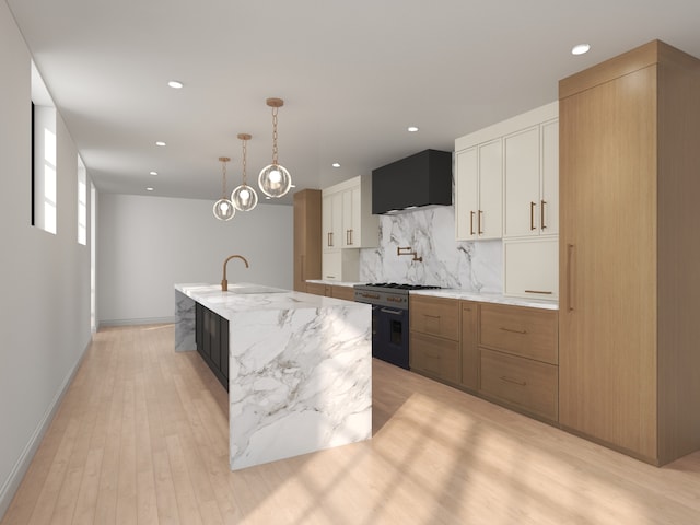 3031 Indianwood Rd, Wilmette, IL 60091 - kitchen with high end range, tasteful backsplash, light wood-style floors, a kitchen island with sink, and a sink