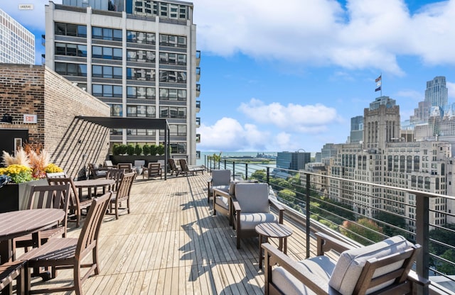 210 E Pearson St Unit 7B, Chicago, IL 60611 - wooden terrace featuring a view of city