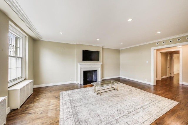 210 E Pearson St Unit 7B, Chicago, IL 60611 - unfurnished living room featuring baseboards, ornamental molding, a fireplace with flush hearth, and radiator