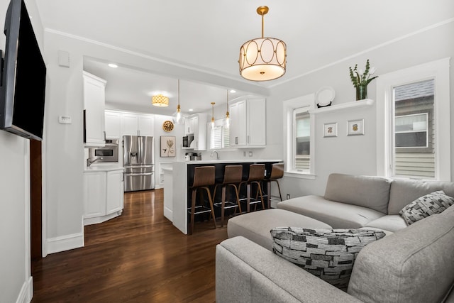 1130 Paulina St, Oak Park, IL 60302 - living area with baseboards and dark wood-style floors