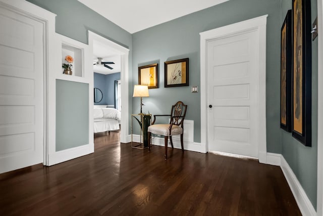 1130 Paulina St, Oak Park, IL 60302 - living area with ceiling fan, baseboards, and wood finished floors