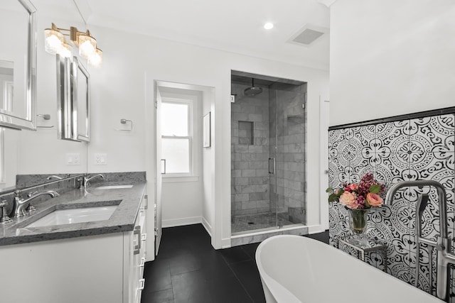 1130 Paulina St, Oak Park, IL 60302 - full bathroom with a stall shower, a soaking tub, a sink, and visible vents