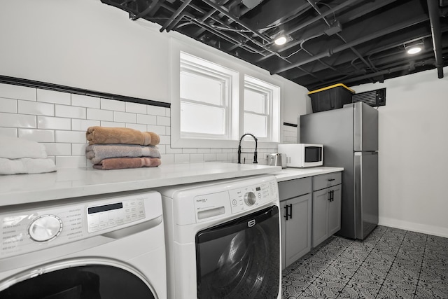 1130 Paulina St, Oak Park, IL 60302 - clothes washing area with baseboards and separate washer and dryer