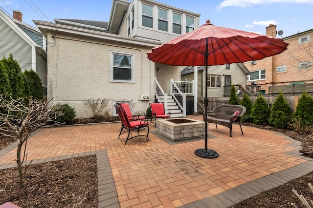 1130 Paulina St, Oak Park, IL 60302 - view of patio featuring an outdoor fire pit