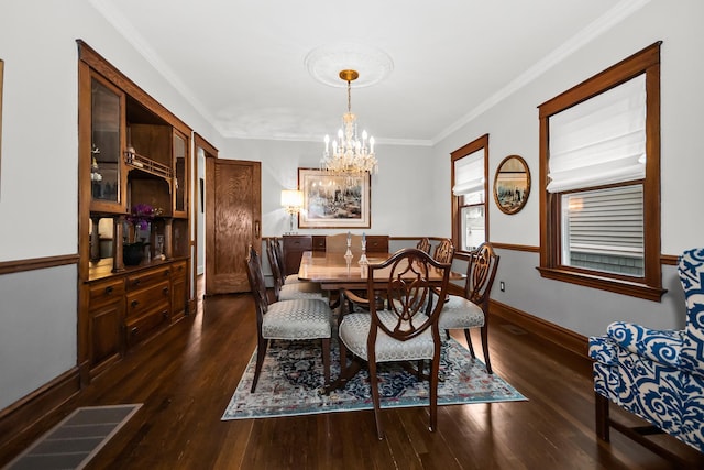1130 Paulina St, Oak Park, IL 60302 - dining room with crown molding, visible vents, a notable chandelier, and dark wood finished floors