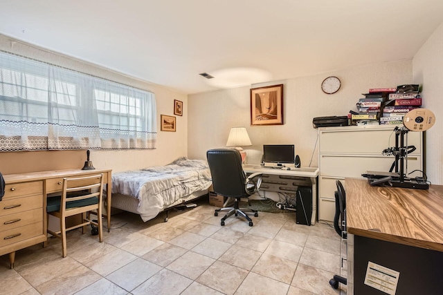 bedroom with visible vents and light tile patterned floors