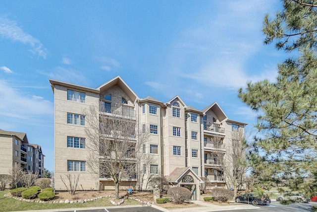 11850 Windemere Ct Unit 103, Orland Park, IL 60467 - view of building exterior with uncovered parking