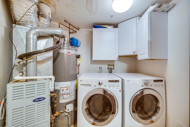 11850 Windemere Ct Unit 103, Orland Park, IL 60467 - laundry room with washer and clothes dryer, cabinet space, and gas water heater