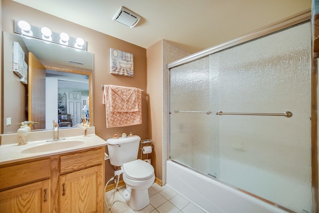 11850 Windemere Ct Unit 103, Orland Park, IL 60467 - full bathroom with tile patterned flooring, vanity, toilet, visible vents, and enclosed tub / shower combo