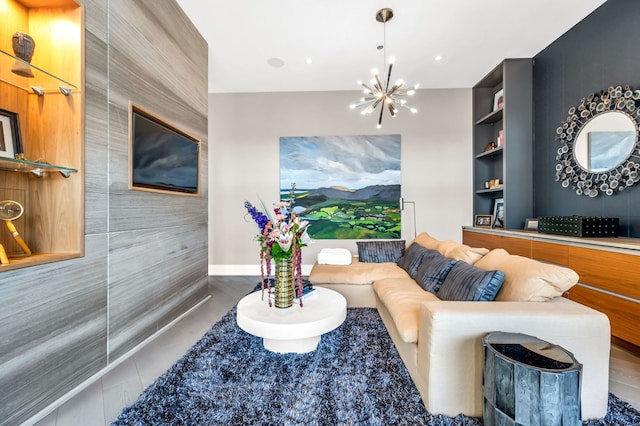 400 W Huron St Unit 501, Chicago, IL 60654 - living area featuring a chandelier, built in features, baseboards, and tile walls