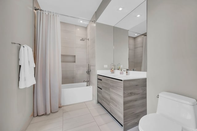 400 W Huron St Unit 501, Chicago, IL 60654 - bathroom featuring toilet, shower / bath combo with shower curtain, vanity, and tile patterned flooring