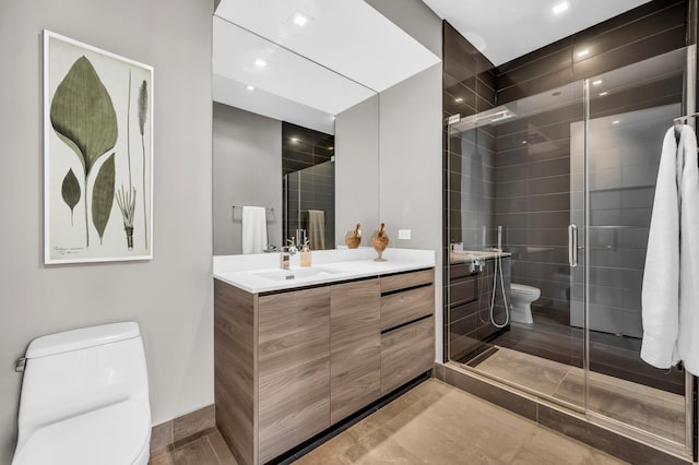400 W Huron St Unit 501, Chicago, IL 60654 - bathroom with toilet, vanity, a shower stall, and recessed lighting