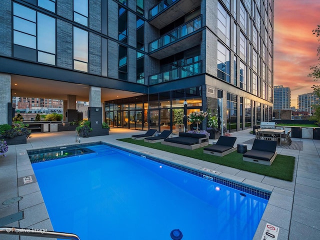 400 W Huron St Unit 501, Chicago, IL 60654 - community pool with a patio area and a view of city