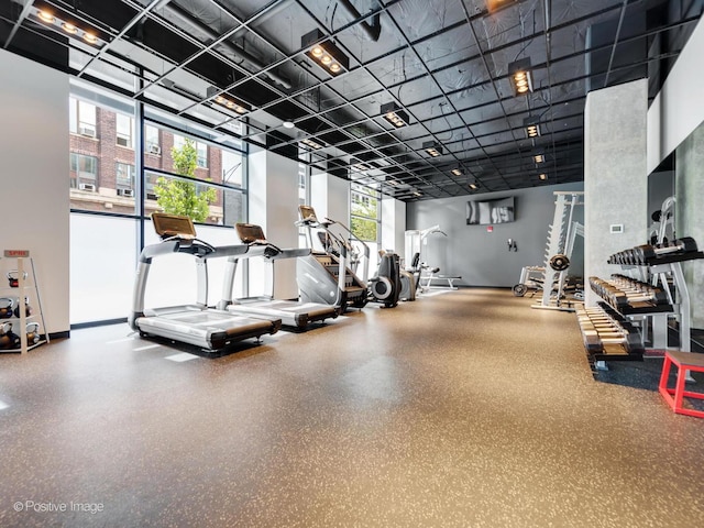 400 W Huron St Unit 501, Chicago, IL 60654 - workout area with a towering ceiling and baseboards