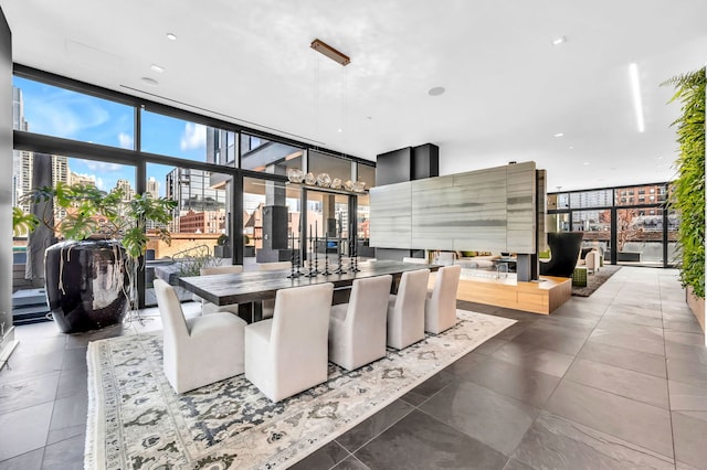 400 W Huron St Unit 501, Chicago, IL 60654 - dining space featuring a wall of windows and a city view