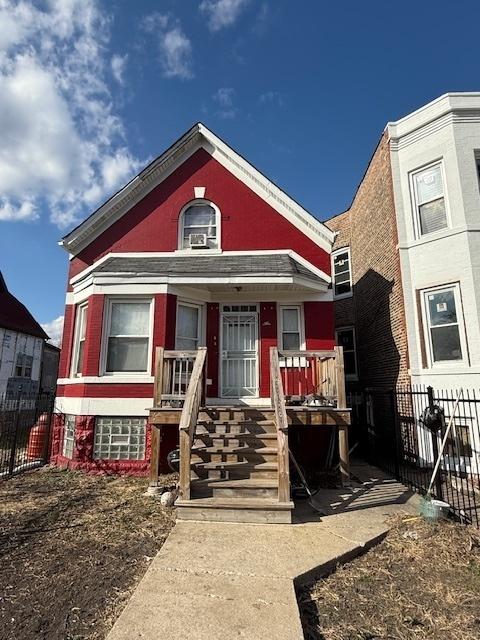 4734 W Monroe St, Chicago, IL 60644 - view of front of house featuring covered porch and fence