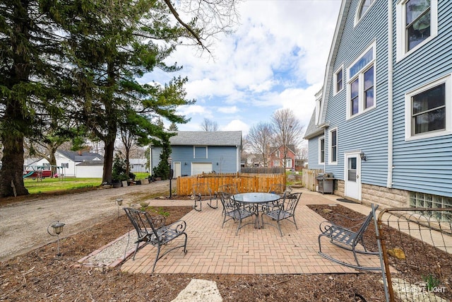 416 Stilson St, Earlville, IL 60518 - view of patio featuring fence, outdoor dining area, and area for grilling