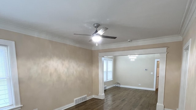 325 W 107th St, Chicago, IL 60628 - spare room featuring dark wood-style flooring, a ceiling fan, ornamental molding, and baseboards