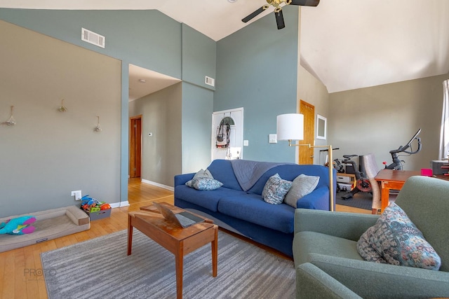 530 N Ashland Ave, Chicago, IL 60622 - living area featuring light wood-style floors, baseboards, a ceiling fan, and visible vents