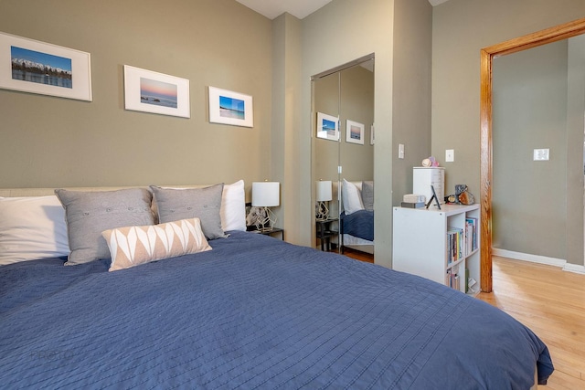 530 N Ashland Ave, Chicago, IL 60622 - bedroom featuring baseboards and wood finished floors