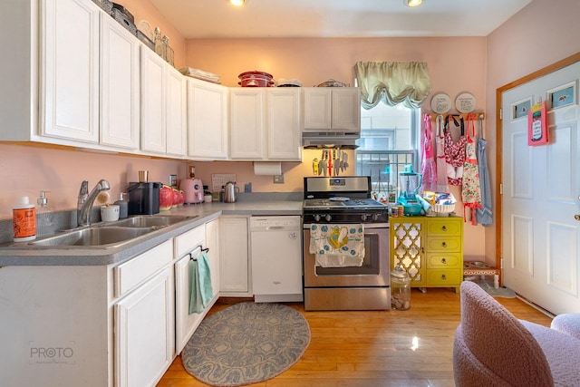 530 N Ashland Ave, Chicago, IL 60622 - kitchen featuring stainless steel range with gas stovetop, dishwasher, a sink, under cabinet range hood, and light wood finished floors