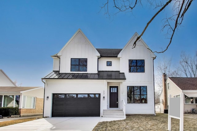 modern inspired farmhouse with an attached garage, metal roof, board and batten siding, concrete driveway, and a standing seam roof