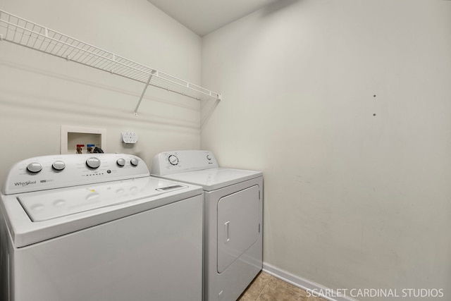 1045 Crane Pt, Elgin, IL 60124 - clothes washing area with washer and clothes dryer, laundry area, and baseboards