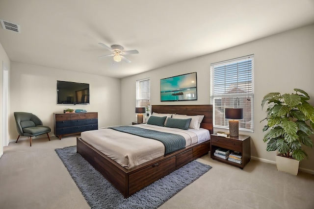 1045 Crane Pt, Elgin, IL 60124 - bedroom with baseboards, light colored carpet, ceiling fan, and visible vents